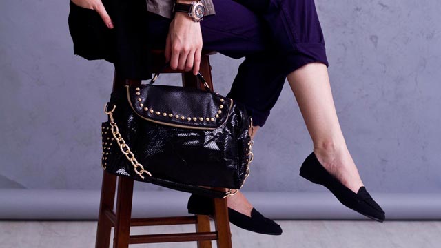 BE FEARLESS, GO ALL-black. Girls who work field jobs and then have to attend functions in the evening will benefit from this. Pick accessories that have character, like this studded rockstar hand bag.