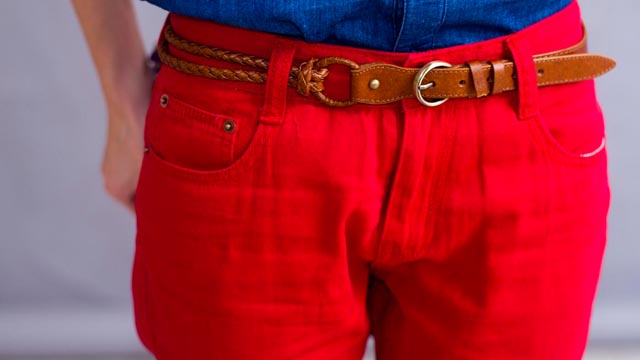 WOVEN BELTS ARE A summer staple. Combine it with red (a holiday staple) and you get a different combination that'll show off your unconventional style.