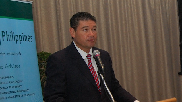 Rick Santos, chairman of CBRE, speaks at a press conference in Makati City. Photo courtesy of CBRE