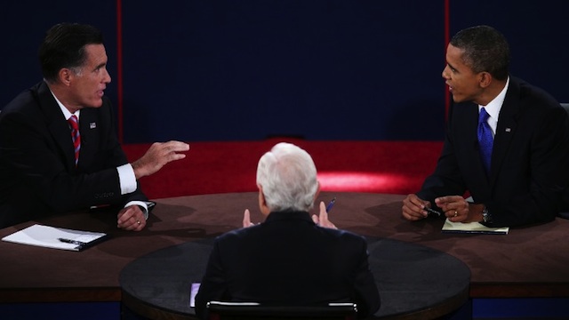 U.S. President Barack Obama (R) debates with Republican presidential candidate Mitt Romney as moderator Bob Schieffer (C) of CBS looks on at the Keith C. and Elaine Johnson Wold Performing Arts Center at Lynn University on October 22, 2012 in Boca Raton, Florida. The focus for the final presidential debate before Election Day on November 6 is foreign policy. Win McNamee/Getty Images/AFP