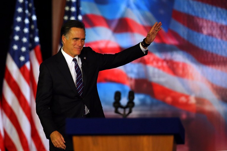 Republican presidential candidate, Mitt Romney, waves to the crowd before conceding the presidency during Mitt Romney's campaign election night event at the Boston Convention & Exhibition Center on November 7, 2012 in Boston, Massachusetts. Joe Raedle/Getty Images/AFP