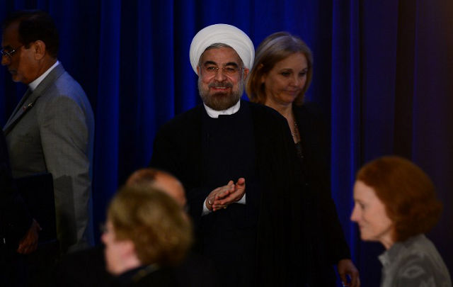IN GOOD FAITH. Iran's President Hassan Rouhani arrives to give a speech at an Asia Society event on the sidelines of the 68th United Nations General Assembly, in New York, September 26, 2013. AFP PHOTO/Emmanuel Dunand