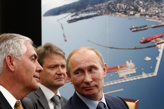 ENERGY POWER. Russia's President Vladimir Putin (R) and ExxonMobil Chairman and CEO Rex Tillerson Wayne (L) attend at the ceremony of the signing of an agreement between state-controlled Russian oil company Rosneft and ExxonMobil in the Black Sea port of Tuapse on June 15, 2012. Photo by AFP