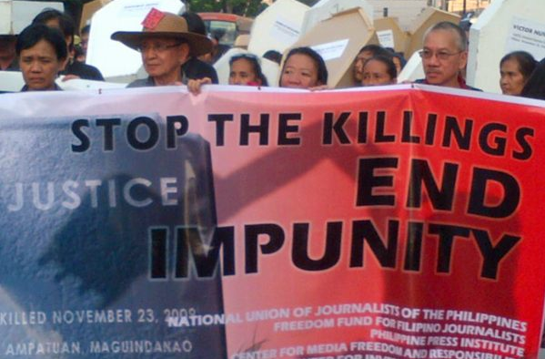 END IMPUNITY. Participants carried mock coffins and banners calling for an end to impunity. Photo from official CMFR Twitter account.