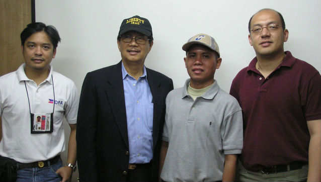 RELEASED. Seguis, second from left, presents Tarongoy (second from right). Also with them is then Consul to Iraq and now Philippine ambassador to Saudi Arabia Ezzedin Tago (far right)