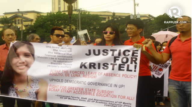 JUSTICE FOR KRISTEL. The Tejada couple, leading the march, is convinced that having to stop schooling indeed took a toll on Kristel. Photo by Rafael Ligsay