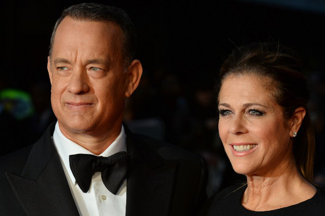 HEAVY AND LIGHT. Hanks with wife Rita Wilson at the London filmfest. Photo: Ben Stansall/AFP