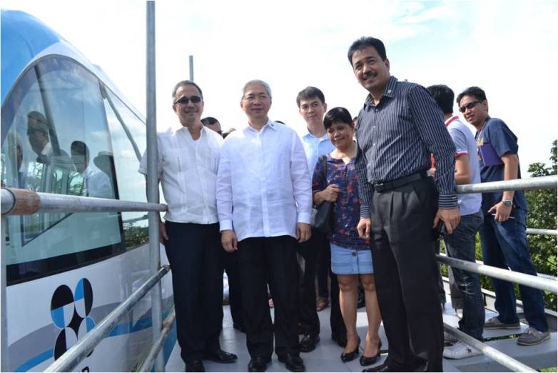 TEST RUN. Automated Guideway Transit completed its maiden run witnessed by DOST Sec Mario Montejo (left), UP President Alfredo Pascual (2nd from left) and other DOST and UP officials. Photo by Joy Lazcano