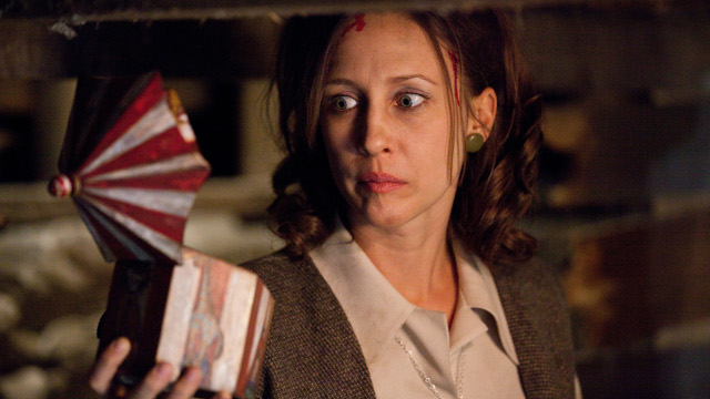 SEEING THINGS. Vera Farmiga finds that something small can be hugely scary. All photos by Warner Bros.
