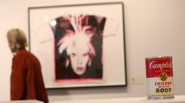 POP ART. Andy Warhol's 'Campbell's Chicken with Rice Soup' (R) stands at a press preview for the Andy Warhol. AFP Photo