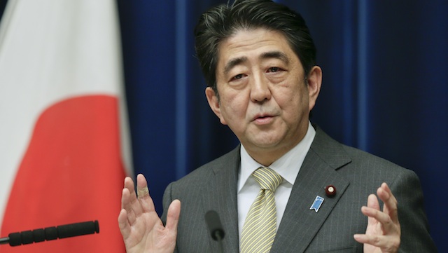 MORE MONEY FOR DEFENSE. In this file photo, Japanese Prime Minister Shinzo Abe speaks during a news conference in Tokyo, Japan, 09 December 2013. EPA/Kimimasa Mayama