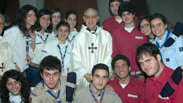 JESUIT LEADER. Jesuit superior general Fr Adolfo Nicolas (center) poses with the youth during a visit to Middle Eastern countries, including Syria, in 2011. Two years later, he slams the United States for a planned attack on Syria. Photo courtesy of www.sjweb.info