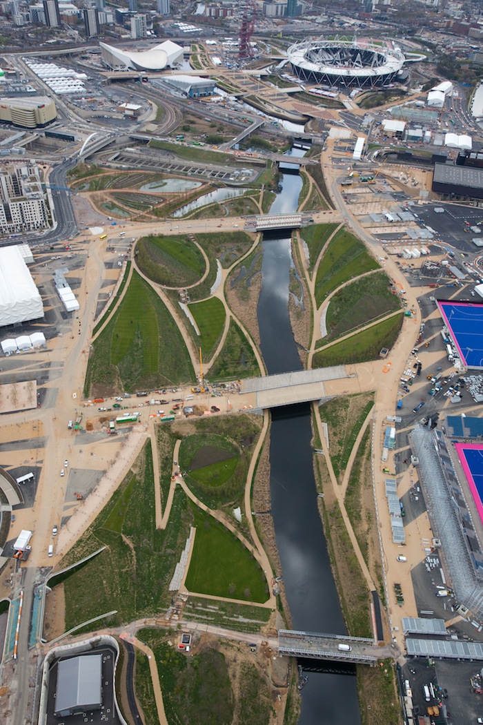 FROM ABOVE. Aerial view of the Olympic Park showing the Parklands looking south towards the Olympic Stadium and Aquatics Center. Courtesy of LOCOG.