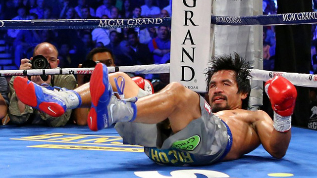 THE WHOLE COUNTRY FELT PACQUIAO's FALL. Pinoys — including celebrities — were quick to express their sentiments on social media. Photo by AFP