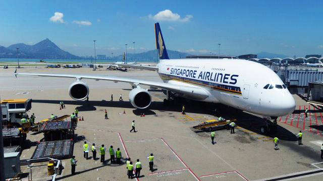 NEW PARTNERS. Singapore Airlines and Tata Sons seal a deal. File photo by AFP