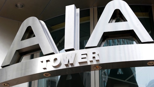 AIG TOTAL EXIT FROM AIA. This photo taken on March 1, 2010 shows signage at the AIA Tower in Hong Kong. AFP PHOTO/MIKE CLARKE