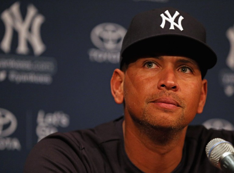BANNED. Alex Rodriguez #13 of the New York Yankees speaks to the media before the Yankees take on the Chicago White Sox at U.S. Cellular Field on August 5, 2013 in Chicago, Illinois. Jonathan Daniel/Getty Images/AFP