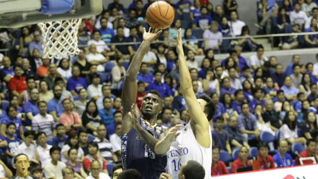 Alfred Aroga of National University rises to the hoop for a layup. Photo by Mark Cristino