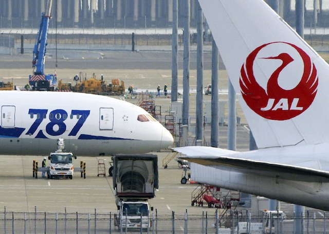 ANOTHER DREAMLINER NIGHTMARE? In this file photo, staff personnel inspecting a grounded All Nippon Airways (ANA) Boeing 787 Dreamliner (L) with a Japanese Airlines (JAL) aircraft seen in foreground (R), at Haneda airport in Tokyo, Japan, 16 Jan 2013. Franck Robichon/EPA