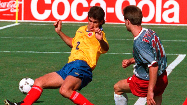 Colombian defender Andres Escobar (L) comes up short as he tried to block the shot of US forward Eric Wynalda during their World Cup first round soccer match in 1994 at the Rose Bowl in Pasadena. Escobar scored an own goal when he deflected a shot by US John Harkes into his own net as the United States won 2-1. AFP PHOTO/MIKE NELSON
