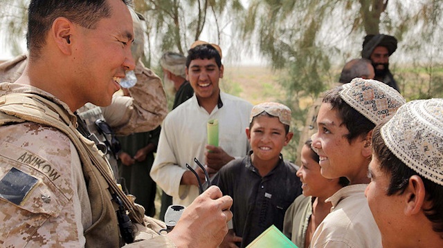 MILITARY MAN. Maj Anikow (L) served in Afghanistan helping develop relationships between the US military and the local population. Photo courtesy of US Marine Cops official Flickr photostream