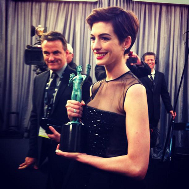 AN OSCAR NEXT? A smiling Anne Hathaway wins Outstanding Female Actor in a Supporting Role in the 19th SAG Awards. Instagram photo from the Screen Actors Guild Awards Facebook page
