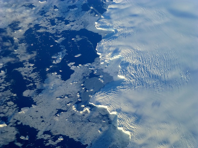 MELTING FAST. Edge of an ice shelf in Adelaide Island, off the Antarctic Peninsula. NASA / Maria-Jose Vinas