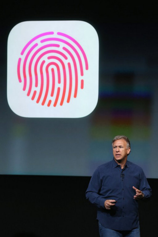 APPLE'S TOUCHID. Apple Senior Vice President of Worldwide Marketing Phil Schiller taks about Touch ID - a security feature of the new iPhone 5S. Photo by Justin Sullivan/Getty Images/AFP