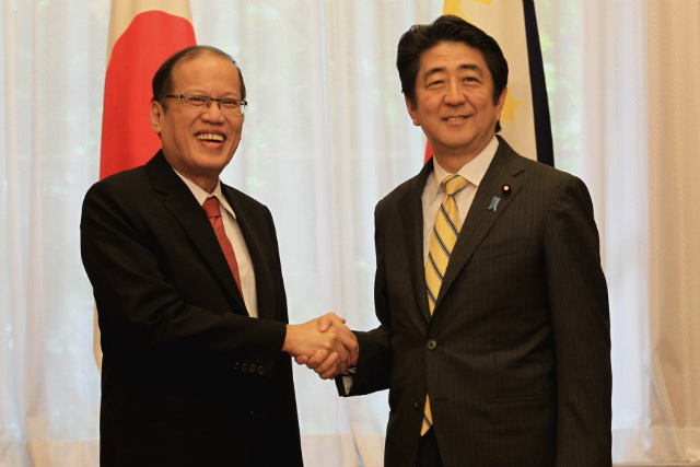 BOOSTING TIES. Philippine President Benigno Aquino III poses with Japanese Prime Minister Shinzo Abe during the joint media statement after the Summit Meeting and Working Lunch at the Prime Minister’s Official Residence in 2-3-1 Nagata-cho, Chiyoda-ku, Tokyo, Japan on June 24, 2014. Photo by Gil Nartea/ Malacañang Photo Bureau
