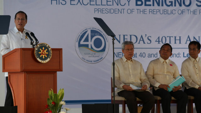 GOOD NEWS. President Benigno S. Aquino III delivers his message during the National Economic and Development Authority (NEDA) 40th Anniversary Celebration at the NEDA Building in Escriva Drive, Ortigas Center, Pasig City on Tuesday, January 29.  In photo are former NEDA Director-General Cayetano Paderanga, Deputy Director-General Rolando Tungpalan and Socio-Economic Planning Secretary Arsenio Balisacan. Photo by Jay Morales / Malacañang Photo Bureau