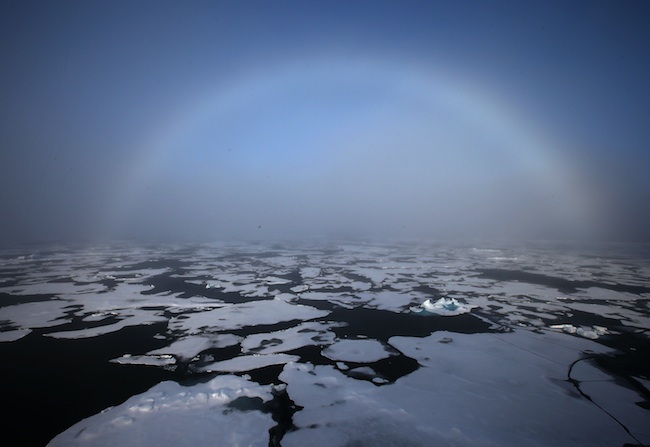 FROZEN SEA. A photo made available 28 August 2013 shows a rainbow appearing over the horizon in the Arctic on Aug. 27, 2013. EPA/YNA