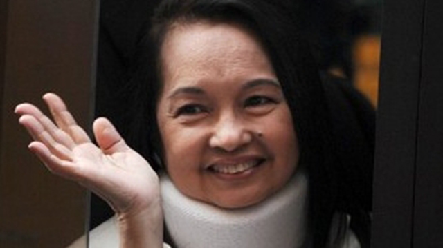 ECONOMY. Former president Gloria Macapagal-Arroyo lauds President Benigno Aquino III for the country's GDP growth. AFP file photo