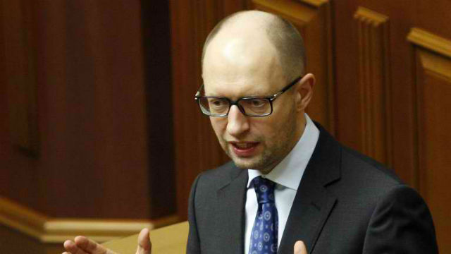 PROVOKE. Ukrainian Prime Minister Arseniy Yatsenyuk accuses Russia of trying to spark a conflict by violating Ukrainian airspace. File photo by Yury Kirnichny/AFP