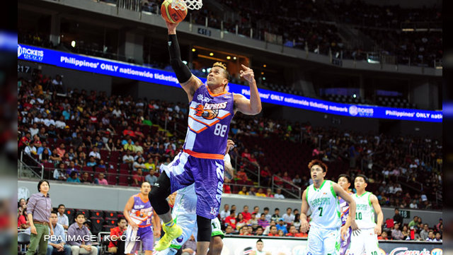 THE ROCK. Asi Taulava leads all Air21 scorers as the Express edge GlobalPort in overtime thriller. Photo by KC Cruz/PBA Images
