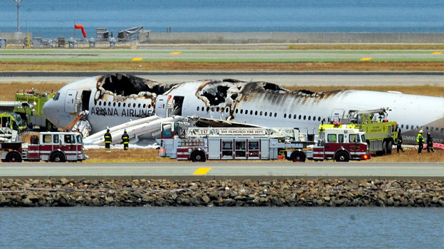 FIRE OUT. An Asiana Airlines Boeing 777 is seen on the runway at San Francisco International Airport after crash landing. Photo by AFP