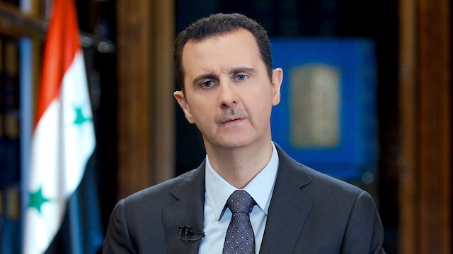 'WE WILL COMPLY.' Syrian President Bashar Al Assad says Syria will comply with the UN Security Council resolution on the country's chemical arsenal. In this file photo, Assad speaks during an interview with the television network TeleSUR, in Damascus, Syria, 25 May 2013. EPA/SANA/Handout 26 Sept 2013