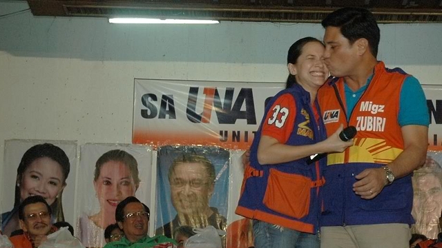 CAMPAIGN MUST? Audrey and Migz Zubiri share a kiss on the UNA campaign stage in Baguio. Photo from Zubiri's Facebook page 