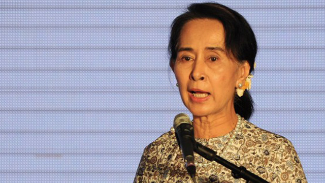 NOT YET. Myanmar's opposition leader says the country still needs a democratic constitution. Photo by AFP
