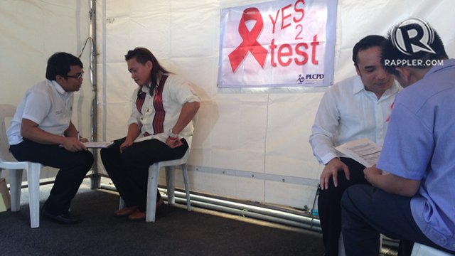 CONFIDENTIAL. Representatives Teddy Baguilat Jr (left) and Barry Gutierrez (right) undergo a free counselling session, normally done in private, before getting tested for HIV/AIDS. Photo by Rappler