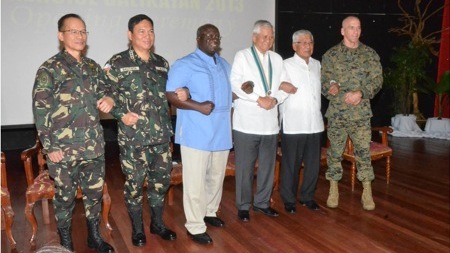 ALLIES. US Ambassador Harry Thomas, Jr (3rd from left) and Foreign Affairs Secretary Albert del Rosario (3rd from right) lead the opening of Balikatan 2013. Photo from the Department of Foreign Affairs