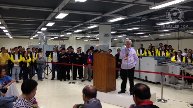 NEW FACILITY. Comelec Chair Sixto Brillantes Jr speaks at the ribbon-cutting of the NPO's new venue for ballot-printing. Photo by Paterno Esmaquel II