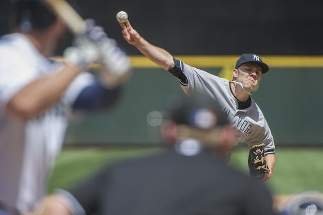 PITCHING IT. A study released June 26, 2013 says our shoulder may have been one of humankind's greatest evolutionary successes. In this file photo, New York Yankee pitcher David Phelps fires a second inning pitch during his game against the Seattle Mariners in Seattle, Washington, USA on 09 June 2013. Photo by EPA/Dan Levine