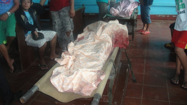 CASUALTY. One of the 6 farm workers killed in the ambush. Photo by Richard Falcatan