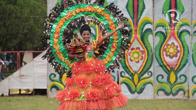 The Child Jesus-bearing dancer from the Tribu Merrymakers of Malitbog Concepcion National High School 