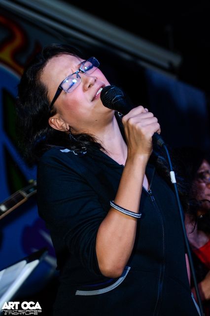 COOKY CHUA's GRUFF, THROATY vocals worked for the Beatles' songs she rendered