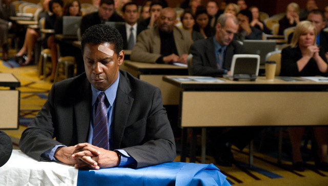THIS MAN HAS SINNED. Denzel Washington’s frequent flyer hits a crossroads 