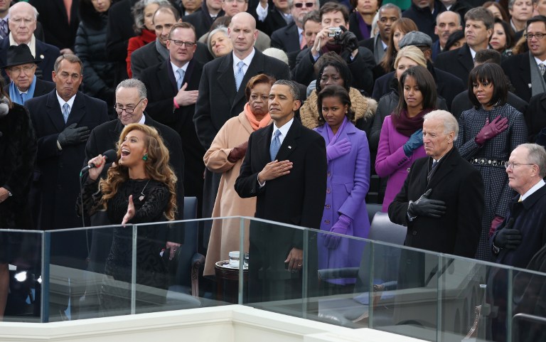 LIP-SYNCHED? Singer Beyonce performs the National Anthem as U.S. President Barack Obama looks on during the public ceremonial inauguration on the West Front of the U.S. Capitol January 21, 2013 in Washington, DC. Alex Wong/Getty Images/AFP