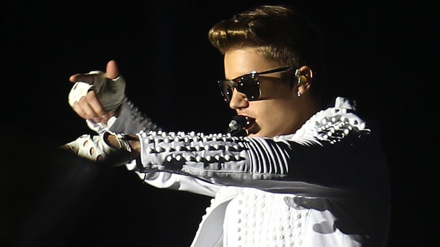 BUSTED? In this file photo, Canadian singer Justin Bieber performs in concert at the Estadio Nacional in Santiago, Chile, 12 November 2013. Mario Ruiz/EPA