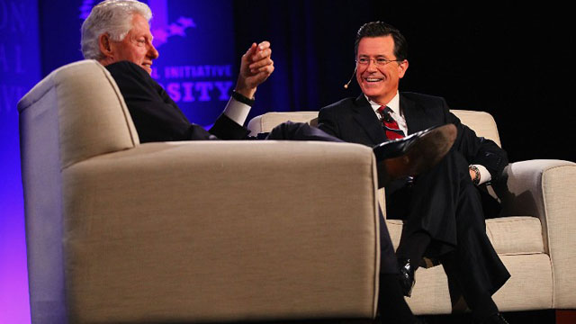 UNITED STATES, ST LOUIS : Former President Bill Clinton and TV personality Stephen Colbert take questions from the audience during the Clinton Global Initiative University at Washington University on April 6, 2013 in St Louis Missouri. AFP/Dilip Vishwanat