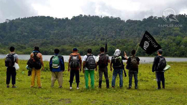 BLACK FLAG. Filipinos carry the black flag in the southern Philippines. Sourced by Rappler